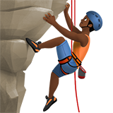 hombre escalando: tono de piel oscuro medio