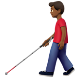 hombre con bastón: tono de piel oscuro medio