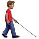 hombre con bastón: tono de piel medio y hacia la derecha