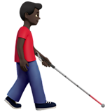 hombre con bastón: tono de piel oscuro y hacia la derecha