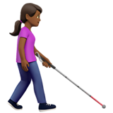 mujer con bastón: tono de piel oscuro medio y hacia la derecha