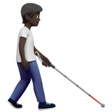 persona con bastón: tono de piel oscuro y hacia la derecha