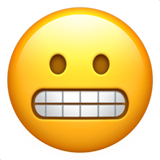Emoticono que muestra los dientes