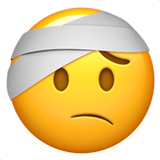 Emoji con vendaje